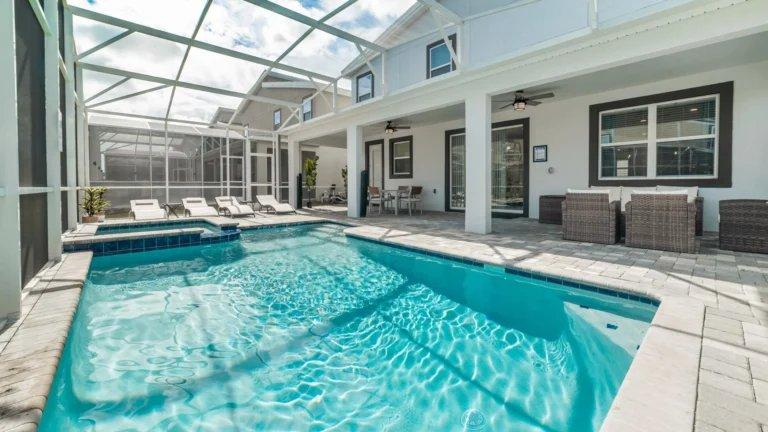 The screened pool deck of a pet-friendly Orlando vacation home